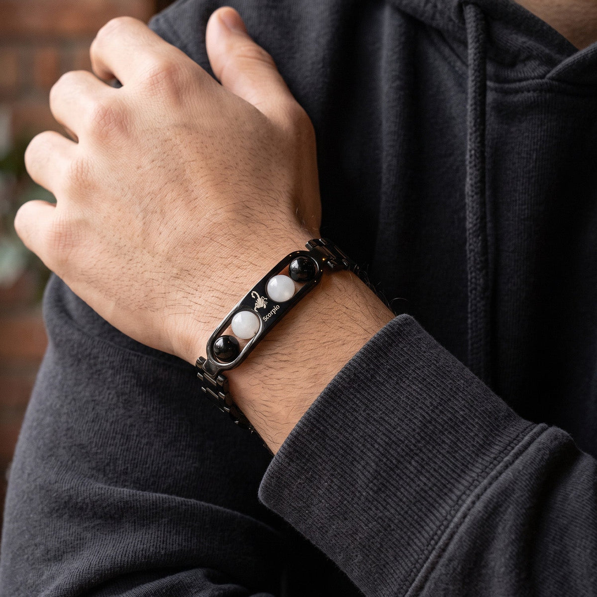 Scorpio Zodiac Metal Bracelet worn on wrist
